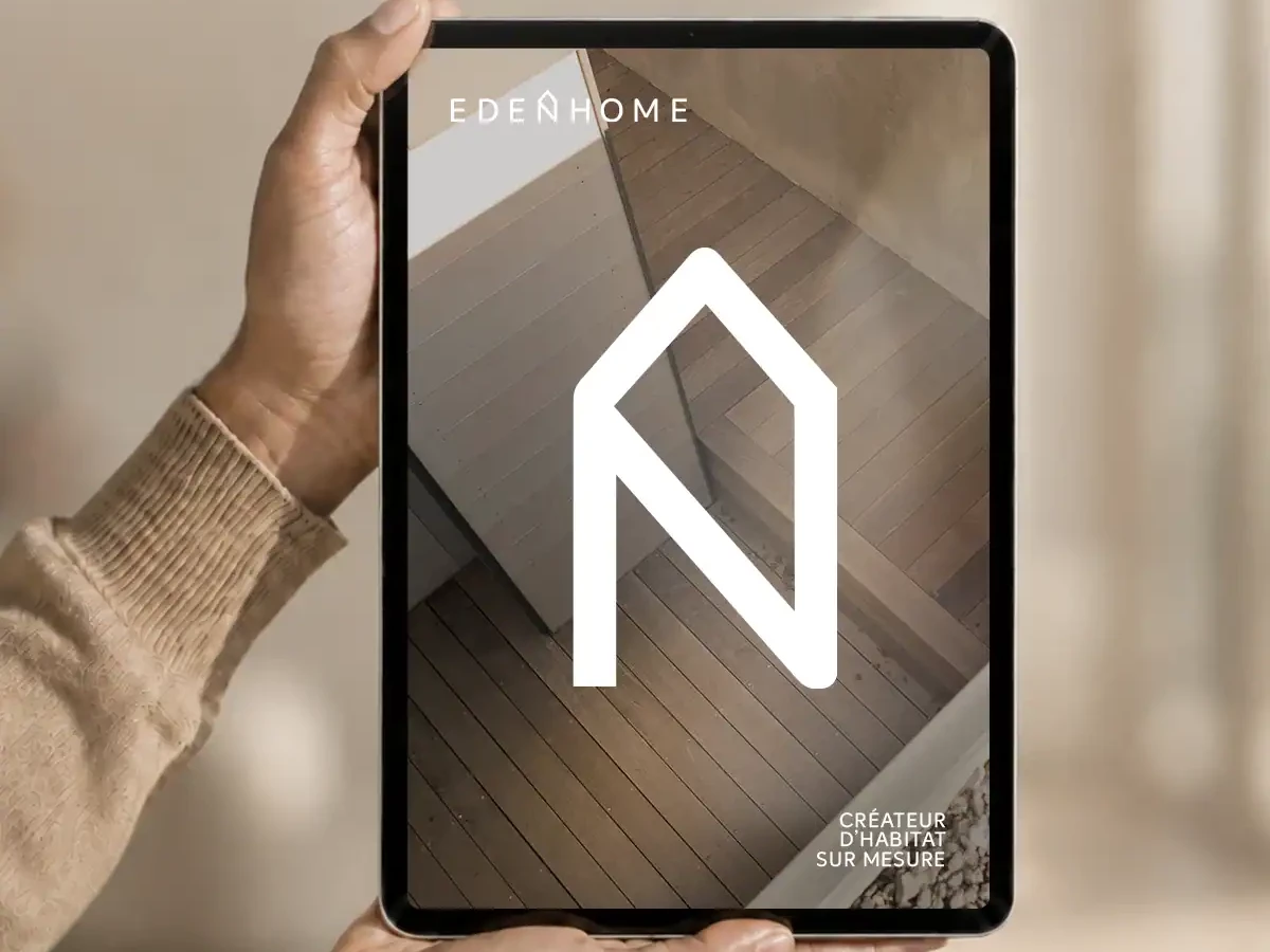 Identité visuelle Eden Home présentée sur une tablette avec le symbole de maison