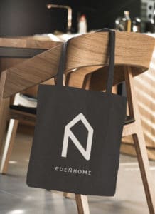 Tote bage Edenhome dans ambiance cuisine en bois, creation du logo et identité visuelle Edenhome dans la région d'Annecy en Haute-Savoie