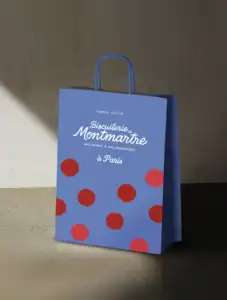 Sac papier Biscuiterie de Montmartre, packaging retail pour une marque parisienne de macarons et gourmandises par Blue1310